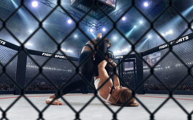 MMA female fighters on professional ring. 