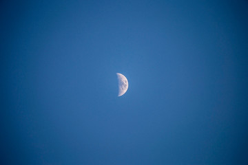 crescent moon in the blue sky in the evening
