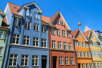 Fototapeta premium Several old historic houses in Copenhagen in Denmark and their colorful facades.