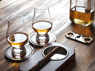 Two glencairn glasses of whisky