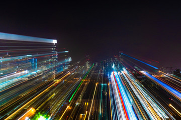 Fototapeta na wymiar Abstract moving city lights; long exposure motion blur