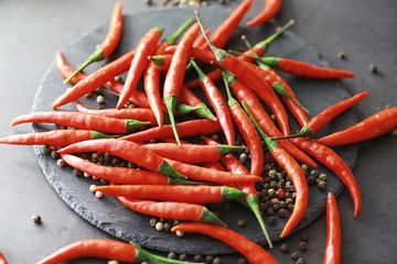 Hot red pepper. Chilean pepper on a black.