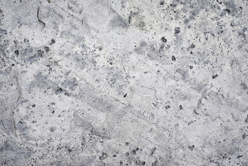 Gray concrete wall as background. Stone texture closeup