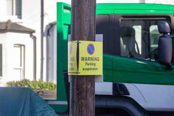 Parking suspension warning sign board on a residential London street