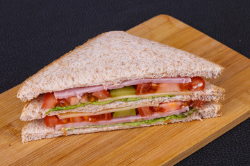 Club sandwich with ham and cheese