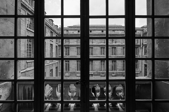 Paris Courtyard Through Window Grid, Urban Pattern Composition