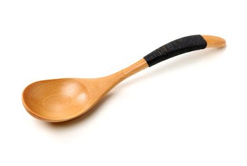 Wooden spoon isolated on white background