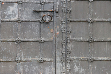 Close-up of the old iron black door