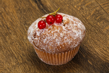 Sweet tasty muffin with red currants