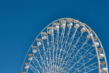 Ferris Wheel Frame Against Blue Sky, Minimal Composition