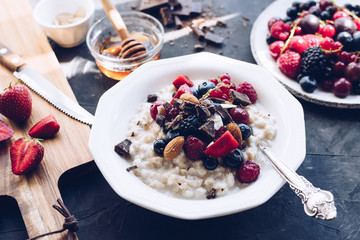 Healthy breakfast oatmeal porrige with berries