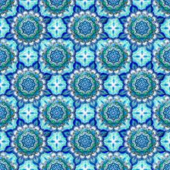 Seamless background from a set of decorative ceramic dishes hand-painted with acrylic paints with a floral pattern