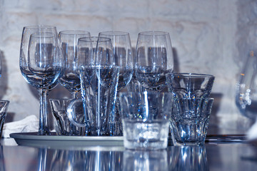 Many of Clean empty wine glasses on the table. Soft focus