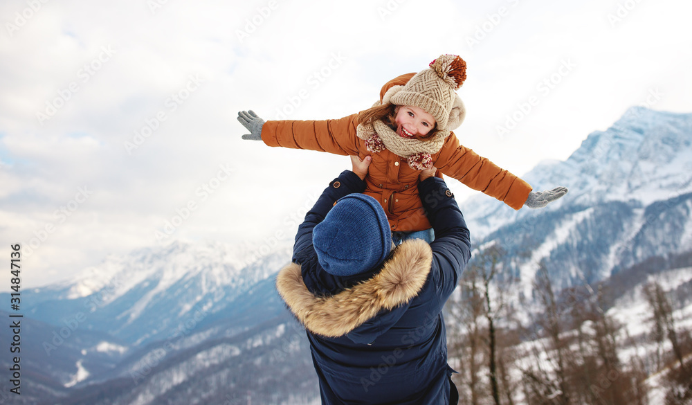 Canvas Prints happy family father and child playing on winter walk.