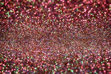 Stardust, mainly red pink, glittering pattern with nice bokeh effect.