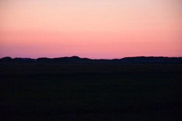 Sonnenuntergang hinter den Dünen 