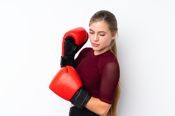 Sport teenager girl over isolated white background with boxing gloves