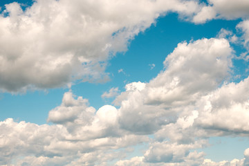 Fototapeta na wymiar light blue sky and clouds on a summer day