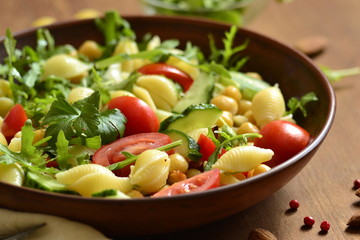 Mediterranean pasta salad with vegetables and chickpeas