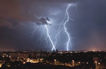 Deurstickers lightning over the city © Bruno
