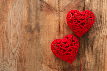 Valentines day concept. red velvet hearts over wooden background. Flat lay composition