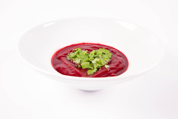 Beetroot cream soup with a heart made of coriander - a romantic treat