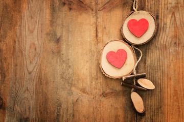Valentines day concept. hearts over wooden background. Flat lay composition