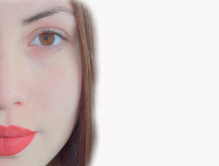 Naklejka premium Attractive young woman with penetrating look and red painted lips