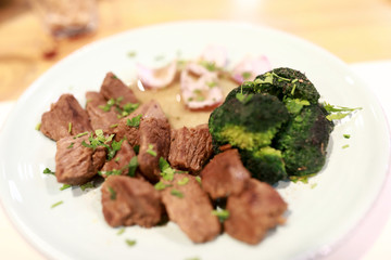 Roasted veal with cauliflower on plate