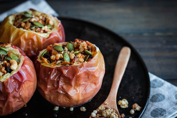 Baked apples with nut granola and pumpkin seeds.