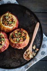 Baked apples with nut granola and pumpkin seeds.