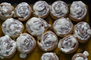 Fresh hot buns Cinnabon with mascarpone cream