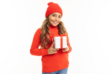 Beautiful caucasian girl holds a white box with gift and has a lot of emotions isolated on white background