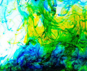 Food color drop and dissolve in water for abstract and background.