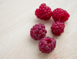 fresh raspberries on white background