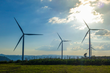 Fototapeta na wymiar Wind turbine with blue sky. Wind energy. Clean energy
