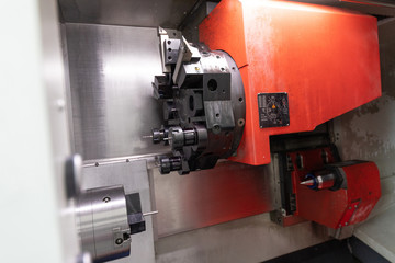 portrait of the working machine in the plant of the metal details