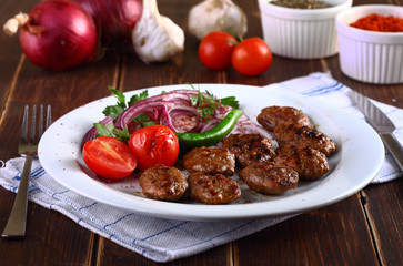 meatball with onion and tomato