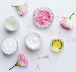 Skincare beauty treatment plant-based products with pink rose petals