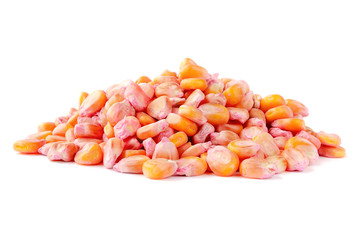 Yellow-red pesticide-treated corn seeds isolated on a white background. Corn seeds for sowing isolated on a white background. A pile of corn seeds for sowing. Corn seeds on a white background.