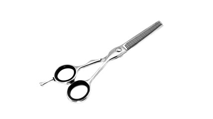 Hairdresser's scissors on a white background