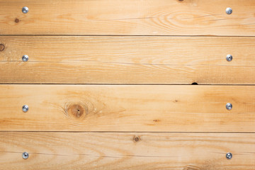 wooden background as texture surface with screws