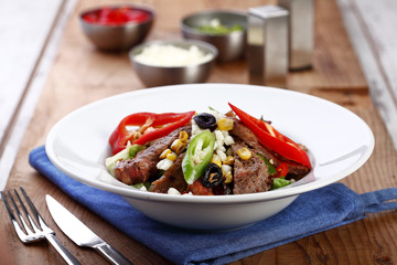 salad with sliced meat
