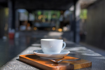 Coffee Cup on table Cafe shop Interior with Blur background