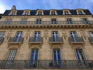 Fototapeta na wymiar Look up and enjoy a different perspective! Buildings in Dijon's historic old town - Burgundy, France