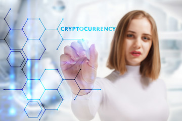 Business, Technology, Internet and network concept. Young businessman working on a virtual screen of the future and sees the inscription: Cryptocurrency