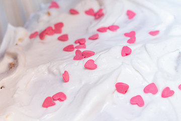 Obraz na płótnie Canvas Heart shape cake decoration cooking process. Valentines day gift preparation dating.