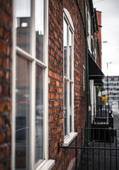street brick red building in manchester UK walking city urban