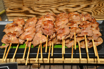 Thai Grilled Pork (Moo Ping) with Sticky Rice is the popular street food in Thailand.