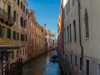 Fototapeta na wymiar Canal in Venice during day time